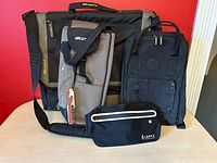 Front view of all four bags and corkscrew