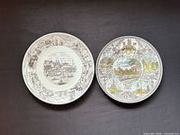 Both souvenir plates side by side showing full designs