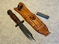 Knife, sheath, and sharpening stone overview