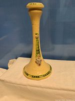 Full view of Roseville pottery candlestick showing form and decoration