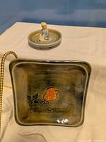 Both porcelain pieces showing form and glaze