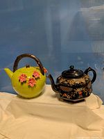 Both teapots side by side displaying overall form and colour