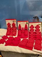 all eight red silicone molds displayed upright and flat