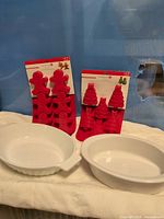 Front view showing two silicone molds and two ceramic dishes