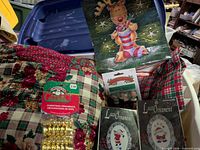 Tote with pillow, ornament kits, bells, gift bag visible