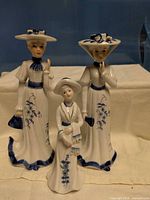 Front view of all three figurines