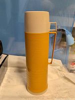 Full view of Thermos with cup attached