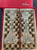 Pair of Baccarat crystal candlesticks in original red boxes with foam inserts