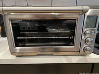 Front view of Breville Smart Oven Pro BOV845 showing control panel and glass door