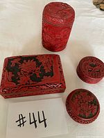 Group view of all four cinnabar boxes