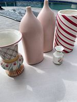 Group shot of all five vases