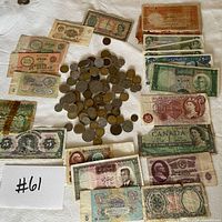 Overview of banknotes and coin pile