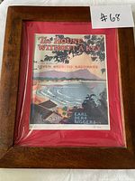 Full view of framed print showing artwork, mat and wood frame