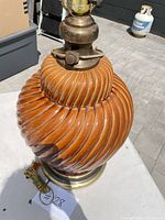 Full view of lamp showing ceramic body, base, and cord