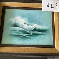 Full view of framed seascape painting