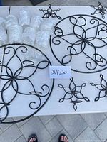 two round frames, bubble-wrapped glasses, two unwrapped glasses, lot label