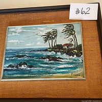 Framed seascape painting overall view