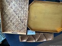 Three trays displayed: parquet tray, gold-base tray, carved sectional tray