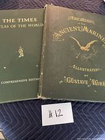 Front covers of both large green hardcover books showing titles