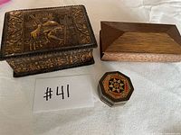 All three wooden trinket boxes displayed together