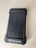 Front view showing full solar panel and 4Patriots branding