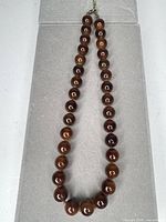 Full view of beaded necklace laid flat