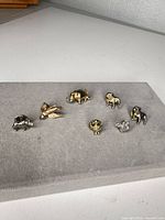 Group shot showing all six animal pins