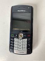 Front view of BlackBerry Pearl phone showing screen, keypad and branding