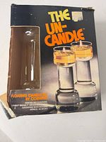 front of Corning The Un-Candle box showing product image