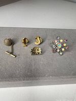 Front view of all five jewellery items