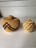 Both baskets side by side showing size difference and overall condition