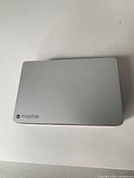 Top view showing silver anodized finish and Mophie logo