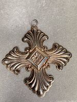 Full view of sterling silver cross ornament front