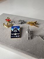 Five visible pins on display block