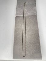 Full view of entire chain laid flat