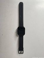 Front view of full smartwatch showing case shape and band