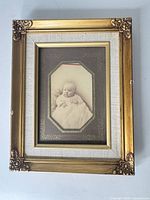 Full view of framed photograph showing frame, mat, and image