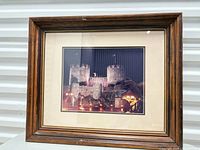 Front view of framed castle photograph with mat and frame visible