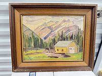 Front view showing full framed painting