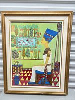 Front view of framed painting depicting Nefertiti in profile