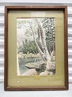 Front view of framed watercolour showing artwork, mat, frame, cracked glass corner