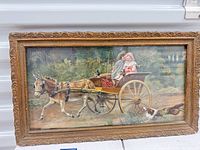 Front view of framed hand-painted print showing subject, frame style, and overall condition