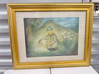 Front view of framed print in gold frame