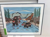 Full view of framed print showing artwork, mat, frame and broken glass