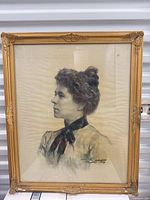 Full view of framed charcoal portrait