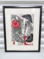 Front view of framed collage showing artwork, mat and frame