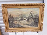 Front view of framed oil painting