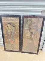 Both framed Asian paintings front view