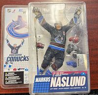 Front view of sealed Markus Naslund action figure in clamshell