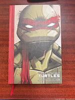 Front cover featuring Raphael, title and series information